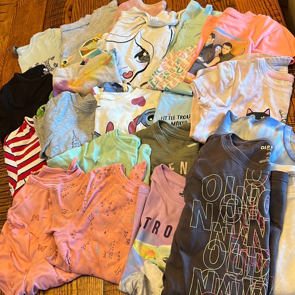 19 t shirts and 2 long sleeved shirts
